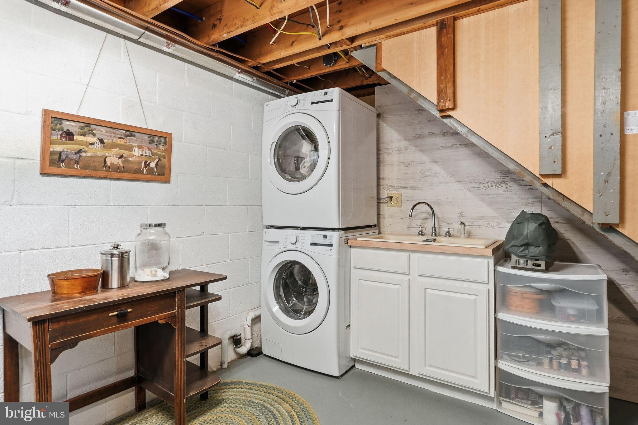 481 James City Road Leon, VA 22725 - Photo 42 of 88 a utility room with dryer and washer