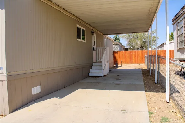a view of a backyard of a house