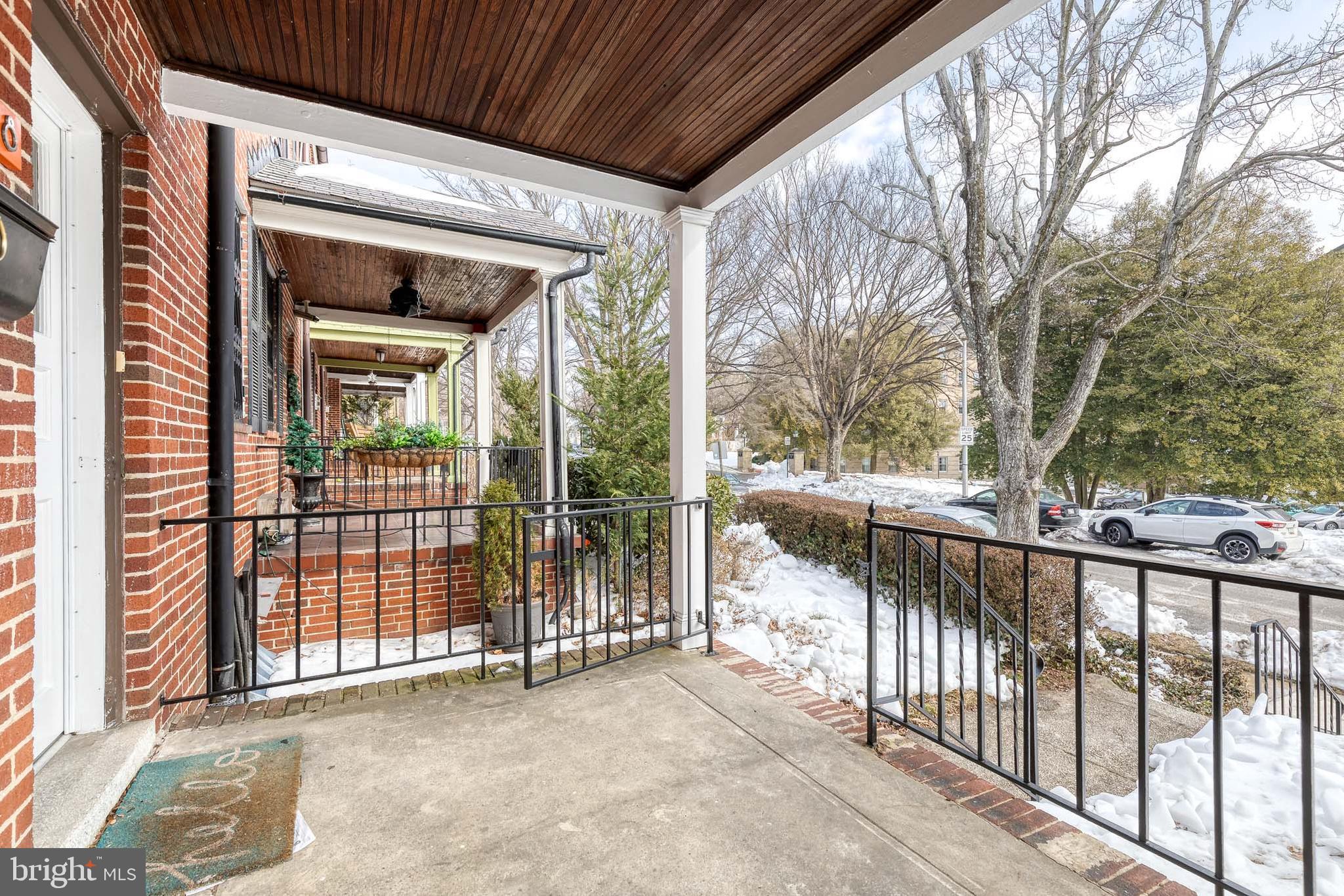 3918 Beech Avenue Baltimore, MD 21211 - Photo 2 of 24 a view of a house with a wooden fence