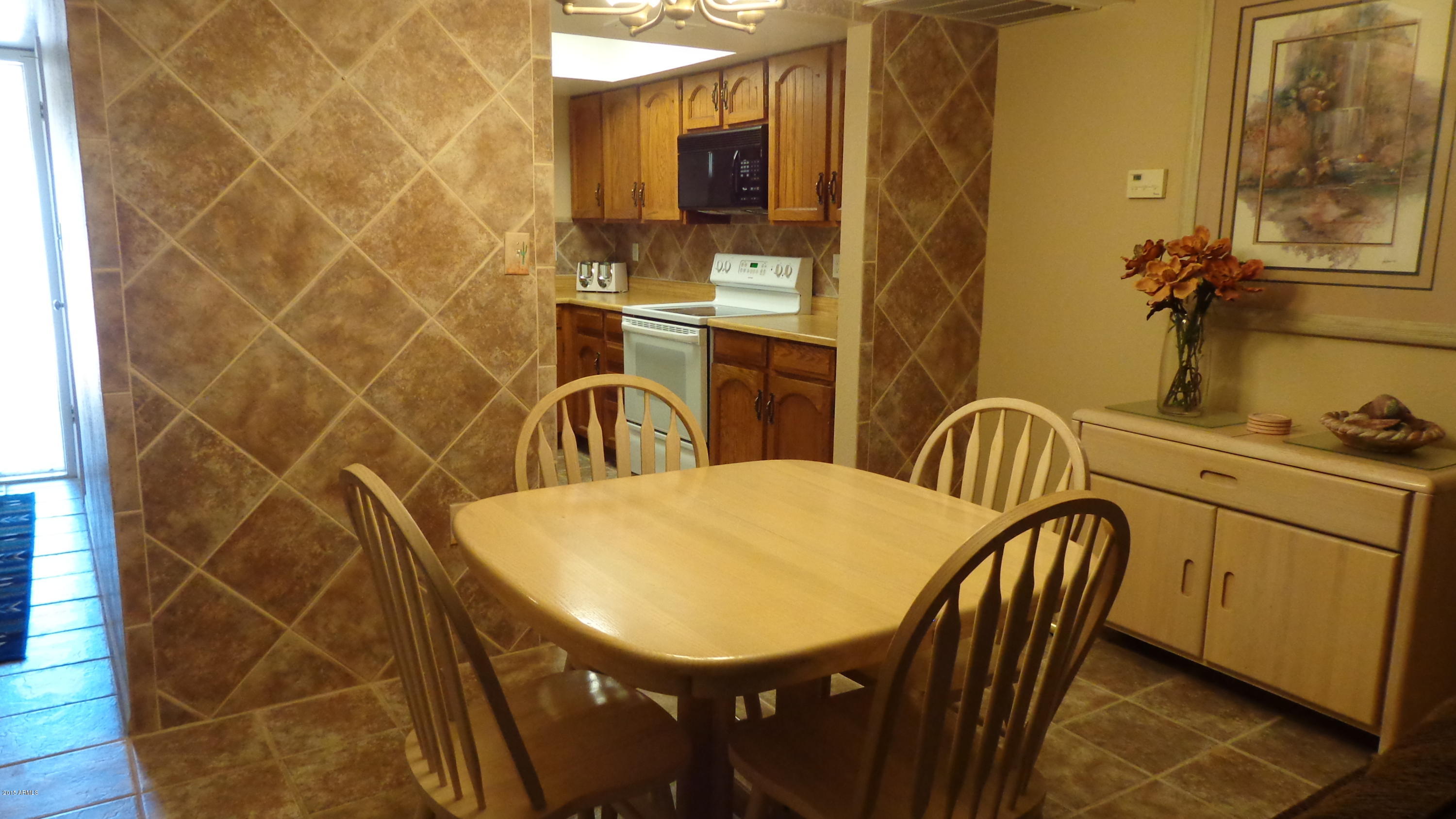 709 South Power Road, Unit 209 Mesa, AZ 85206 - Photo 3 of 34 3 Dining Room 2
