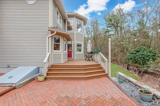 a view of a building with stairs and a yard with stairs