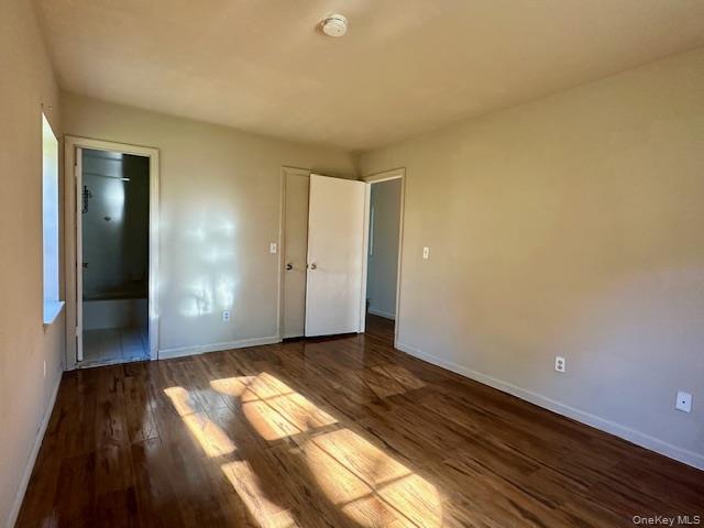 13 Lexington Hills Road, Unit 8 Harriman, NY 10926 - Photo 11 of 18 a view of an empty room and wooden floor