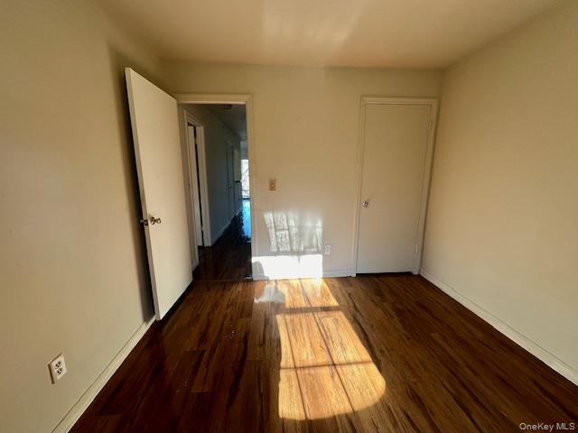 13 Lexington Hills Road, Unit 8 Harriman, NY 10926 - Photo 14 of 18 a view of an empty room and wooden floor