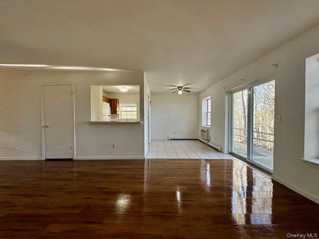 13 Lexington Hills Road, Unit 8 Harriman, NY 10926 - Photo 6 of 18 a view of a room with wooden floor and window