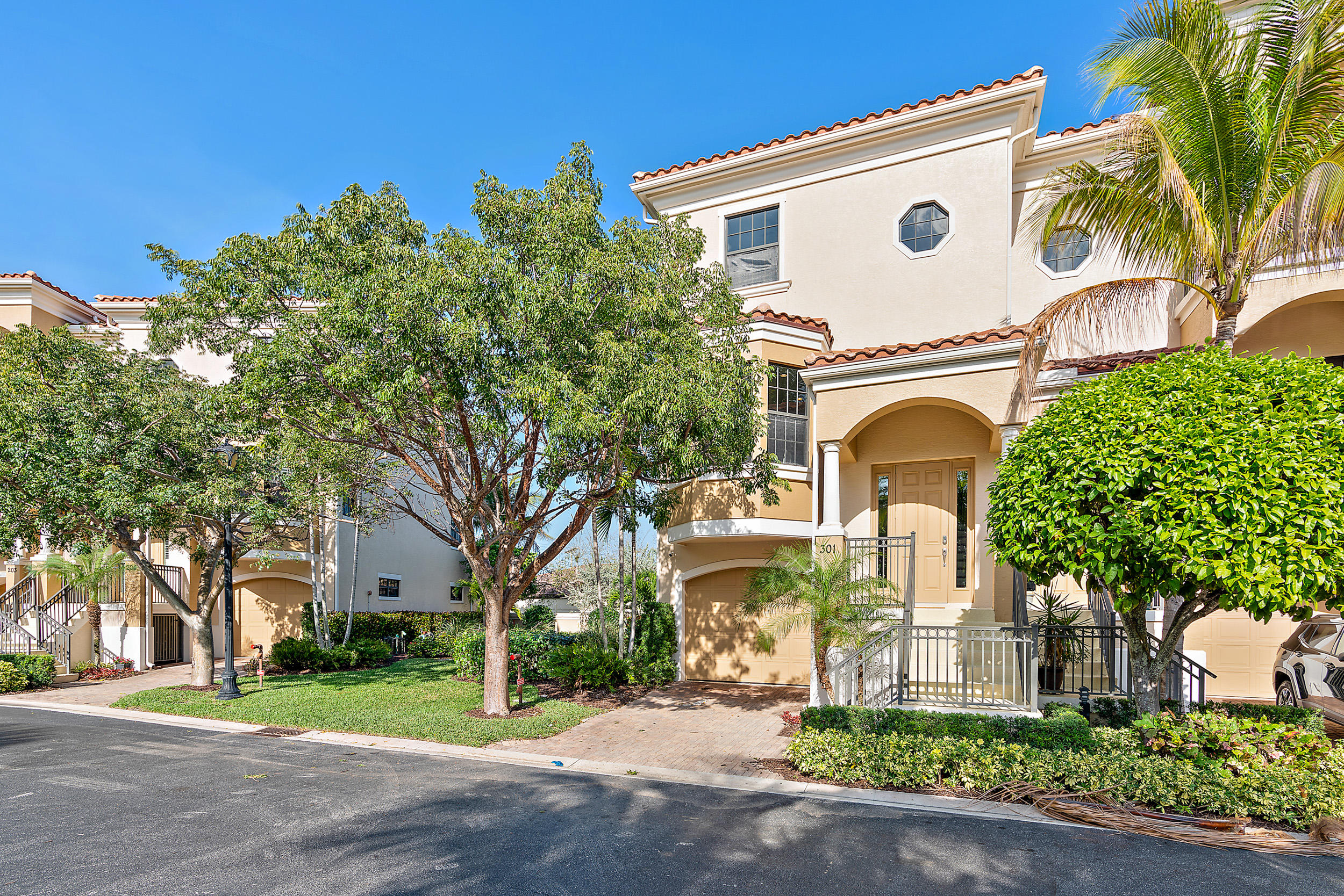 301 Del Sol Circle Tequesta, FL 33469 - Photo 2 of 39 Luxury Townhome Front