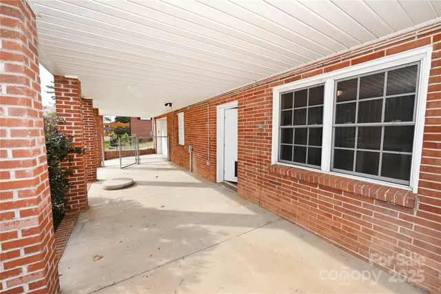 a view of a house with a street
