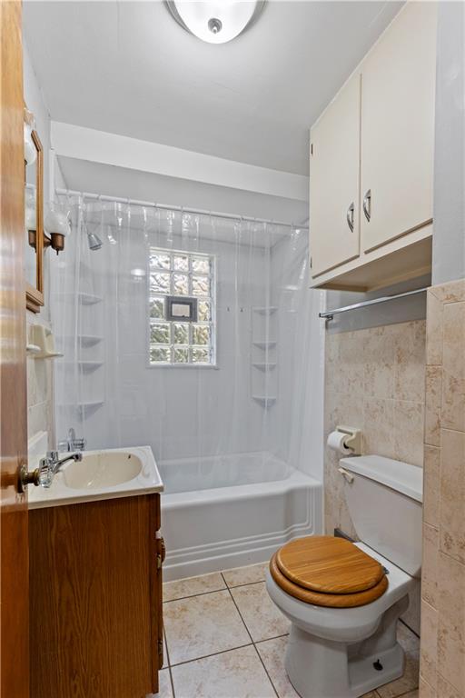 124 Saunders Station Road Trafford, PA 15085 - Photo 14 of 27 a bathroom with a sink a toilet and a mirror