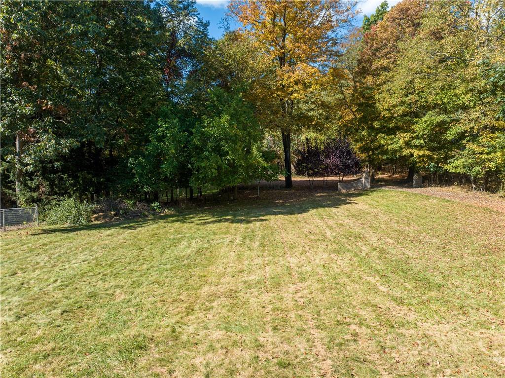 124 Saunders Station Road Trafford, PA 15085 - Photo 22 of 27 a view of a yard with trees