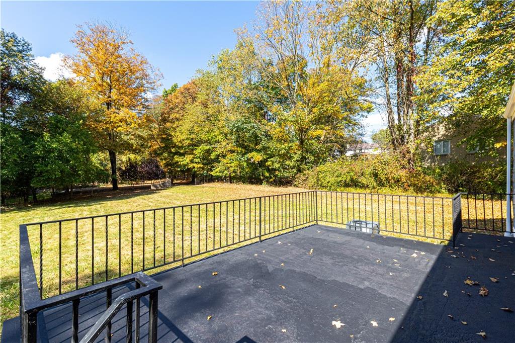 124 Saunders Station Road Trafford, PA 15085 - Photo 23 of 27 a view of balcony with a floor to ceiling window and wooden fence