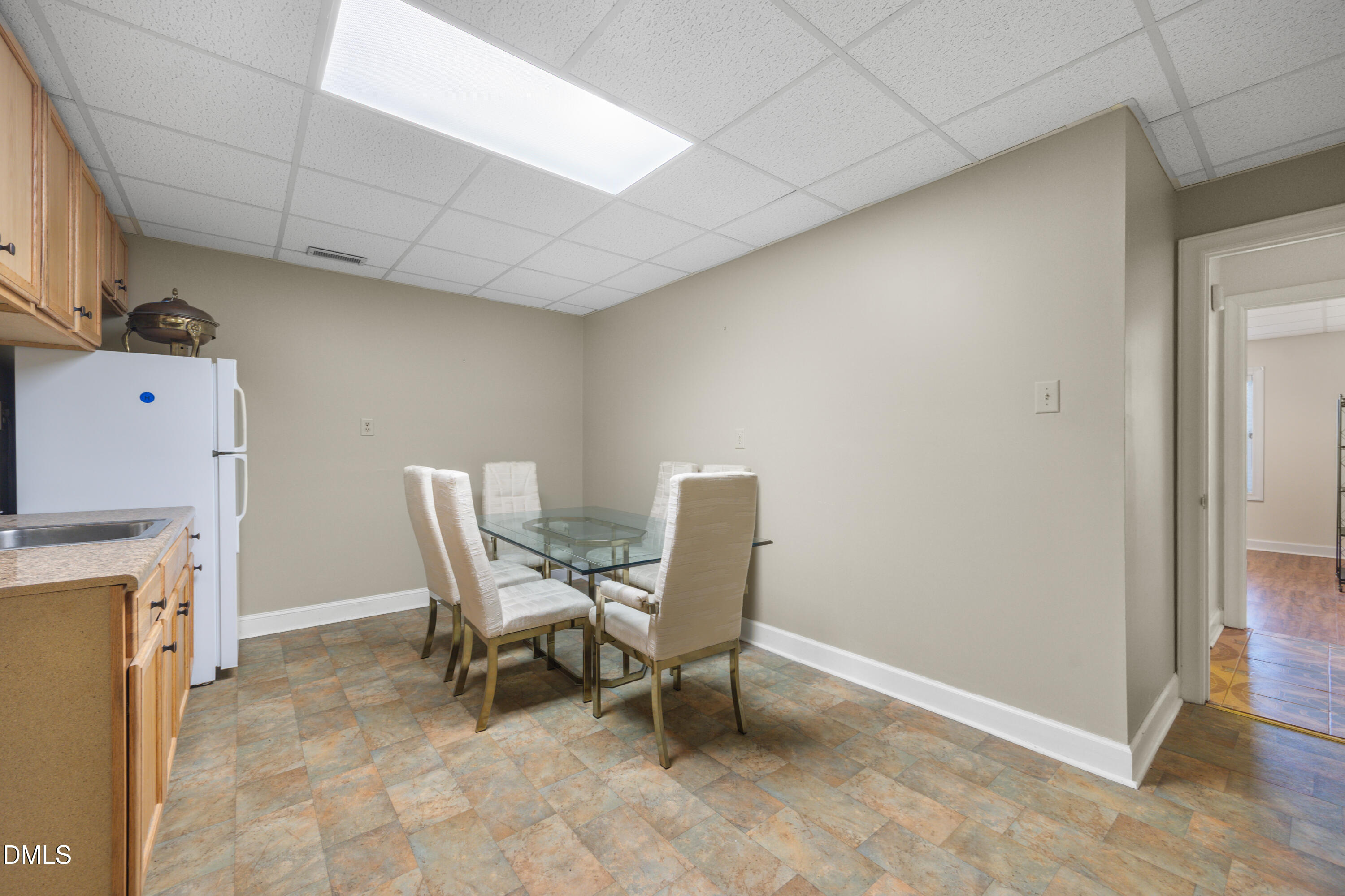 5012 Rock Quarry Road Raleigh, NC 27610 - Photo 41 of 63 Lower Level Kitchenette and Laundry