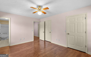321 Anderson Road Statesboro, GA 30458 - Photo 16 of 45 an empty room with closet and fan