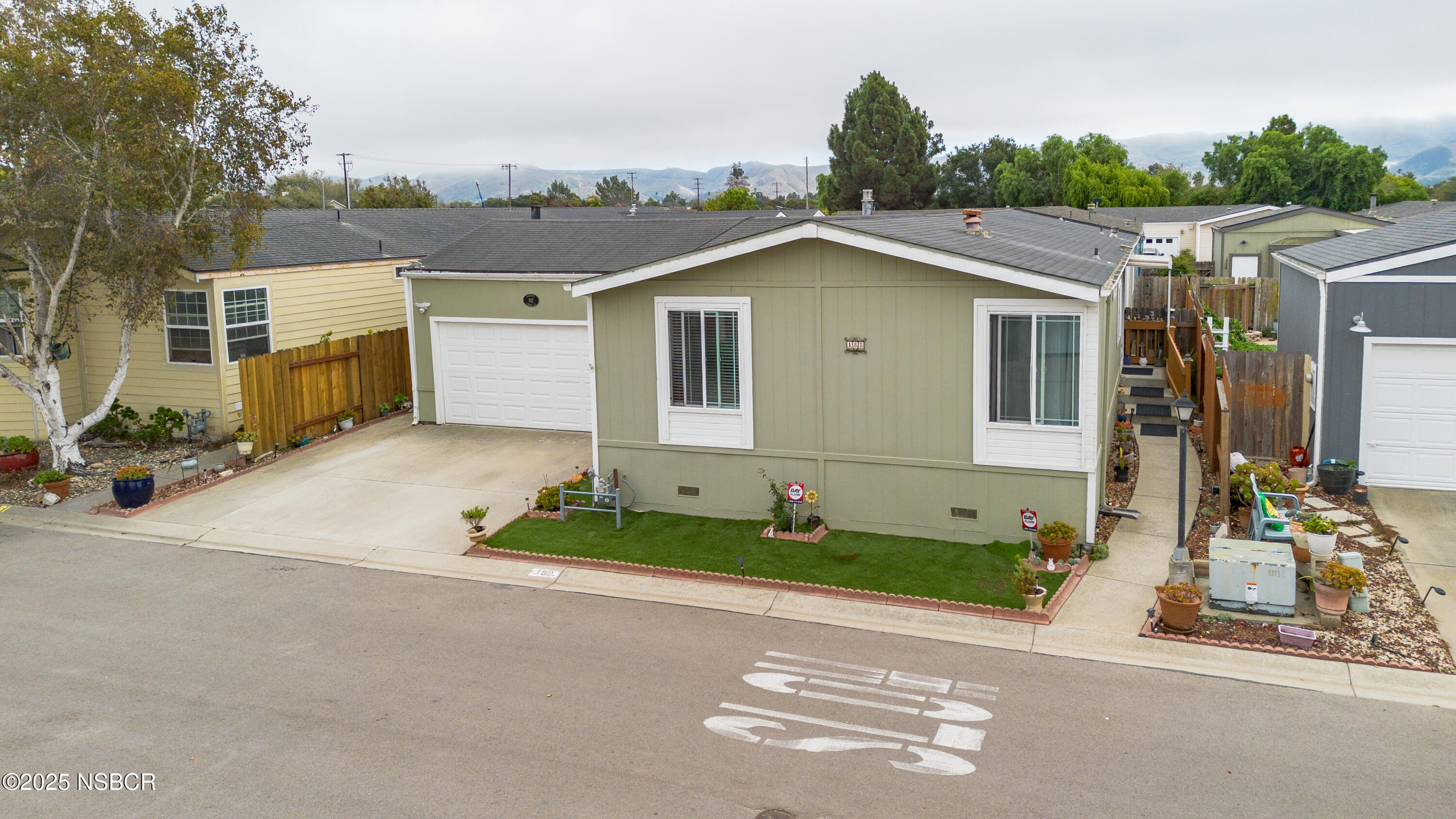 front view of a house with a street