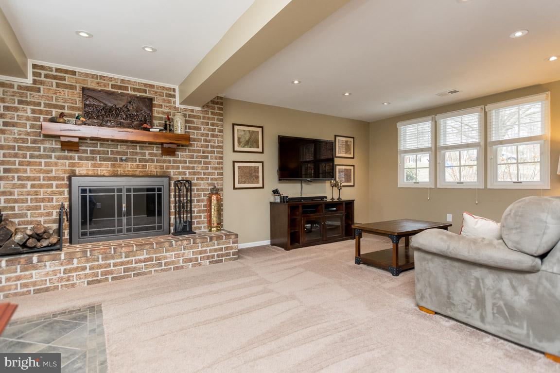 393 Ronsdale Road Sykesville, MD 21784 - Photo 21 of 30 Wood-burning fireplace in the rec room!