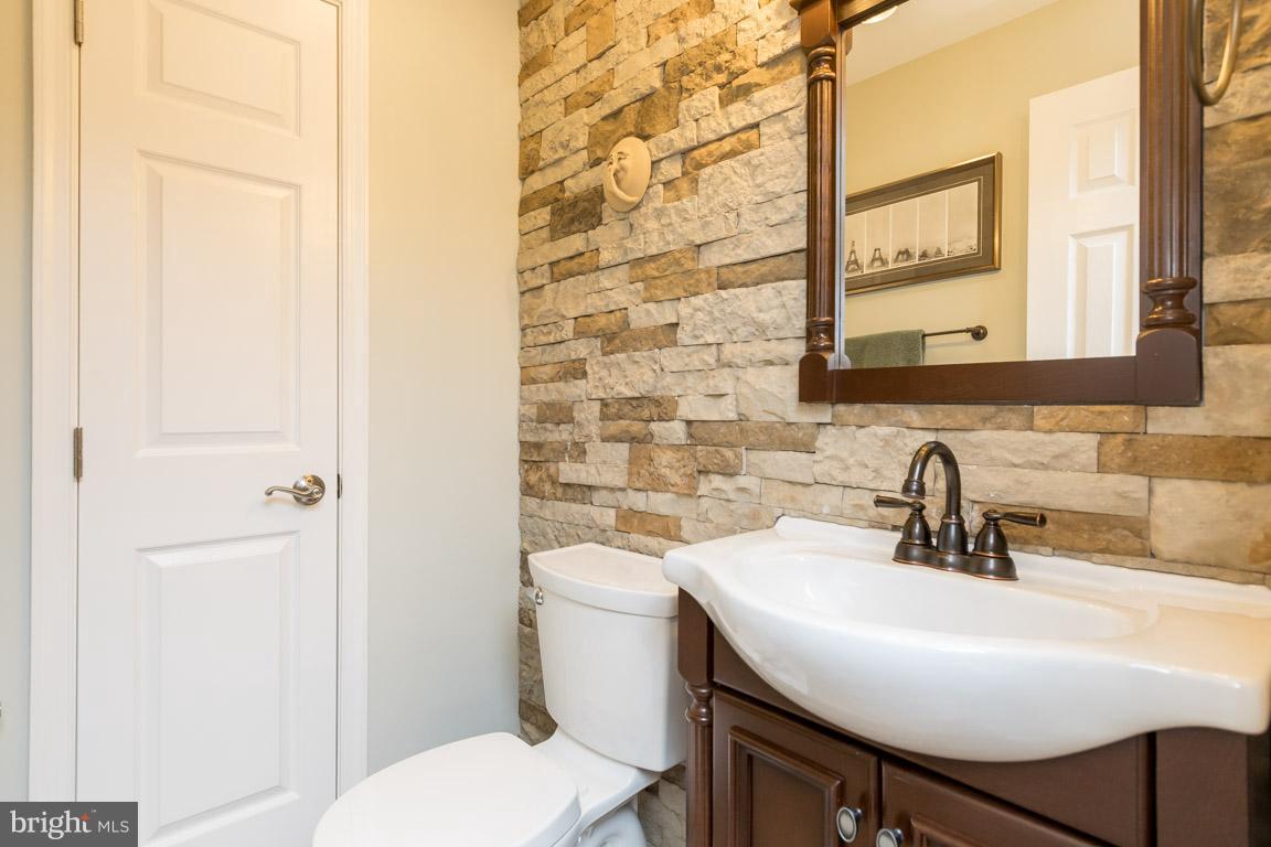 393 Ronsdale Road Sykesville, MD 21784 - Photo 22 of 30 Half bath adjacent to wet bar