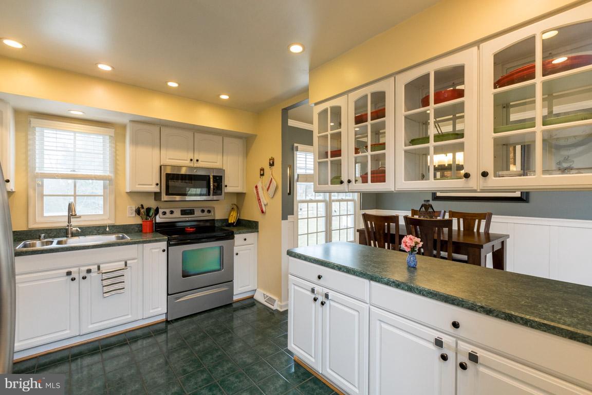 393 Ronsdale Road Sykesville, MD 21784 - Photo 5 of 30 Kitchen w stainless appliances, tile floor