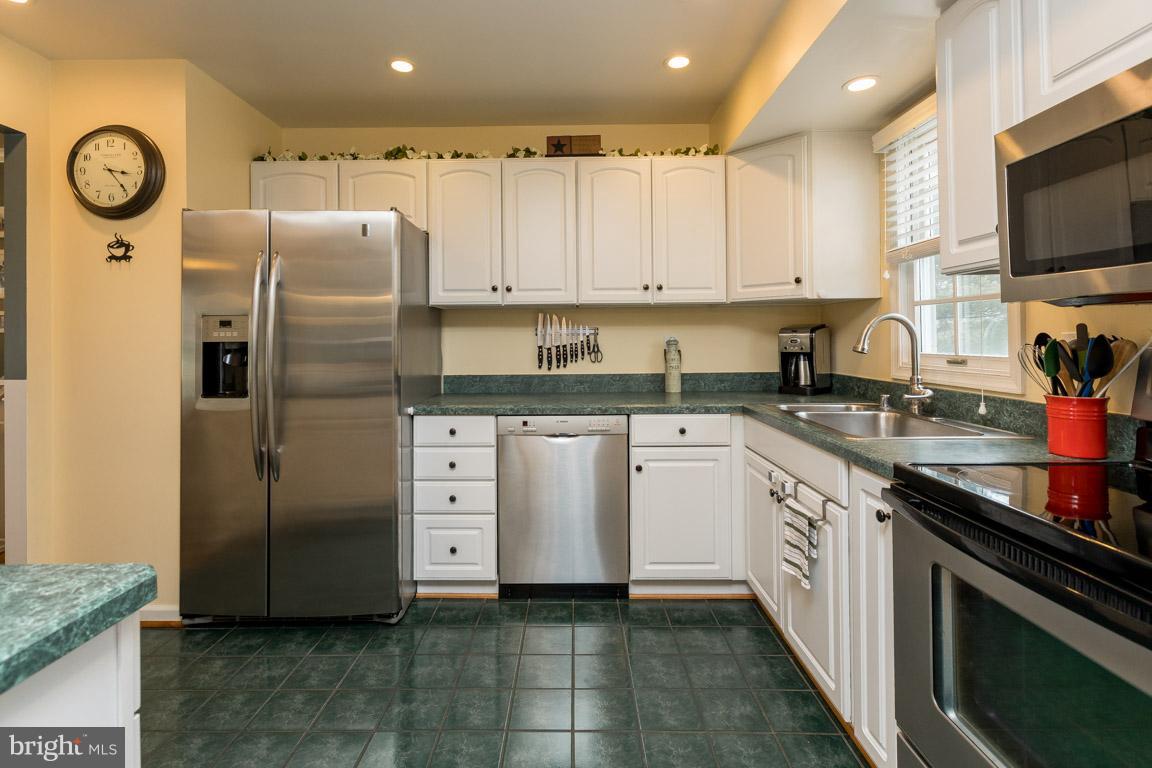 393 Ronsdale Road Sykesville, MD 21784 - Photo 6 of 30 Kitchen w stainless appliances, tile floorKitchen