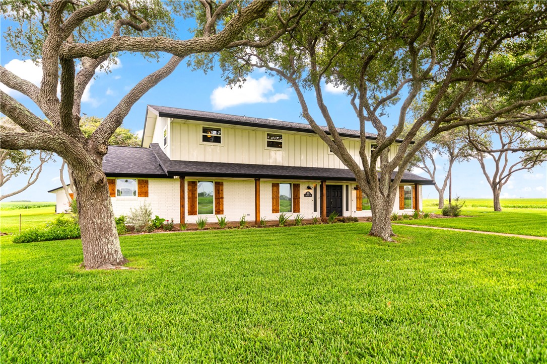 501 South County Road 1140 Riviera, TX 78379 - Photo 2 of 40 Front view of a large ranch-style home featuring e