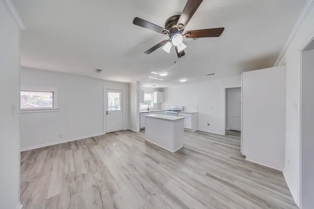 a view of kitchen and windows