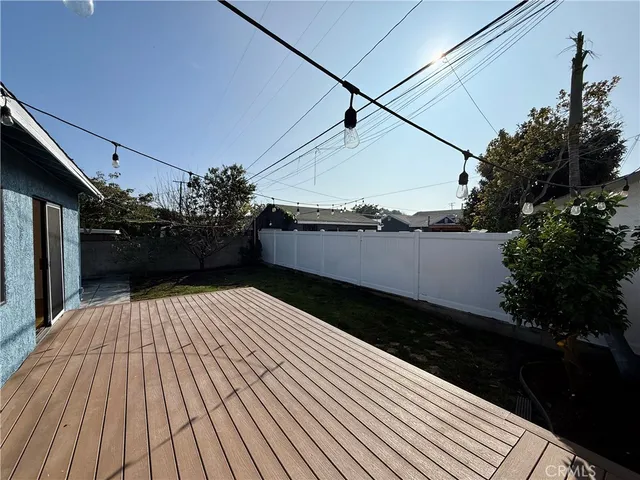 a view of a backyard of the house