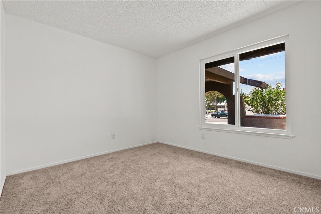 21124 Rosedell Drive Saugus, CA 91350 - Photo 8 of 14 an empty room with a window