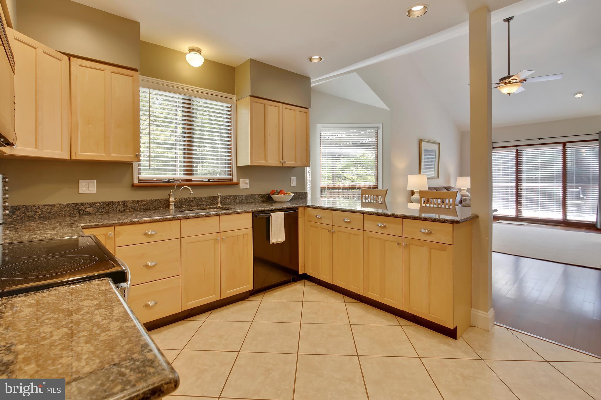 16471 Frederick Road Woodbine, MD 21797 - Photo 13 of 30 Ciounter seating & open to the family room