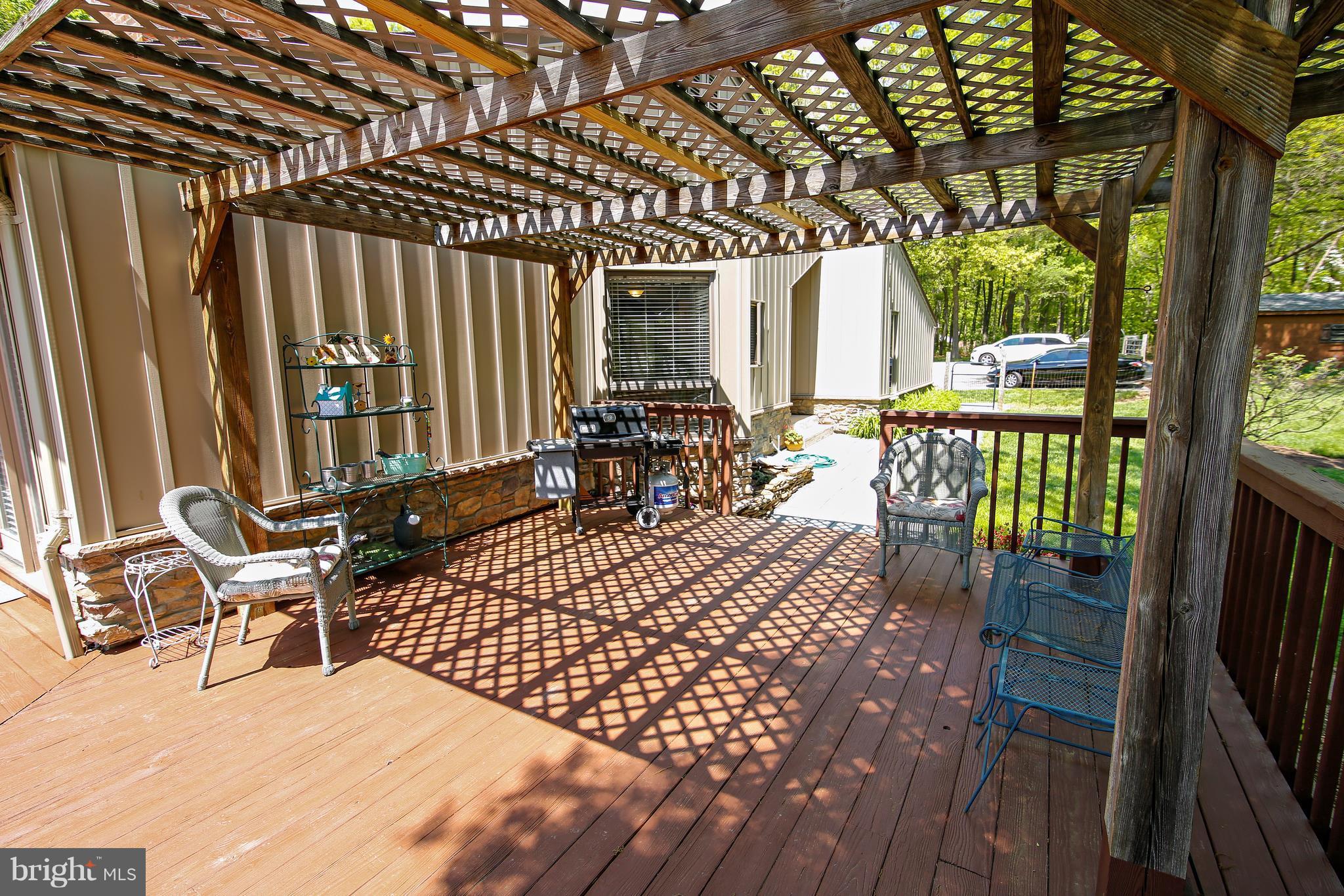 16471 Frederick Road Woodbine, MD 21797 - Photo 19 of 30 Wrap around deck with pergula