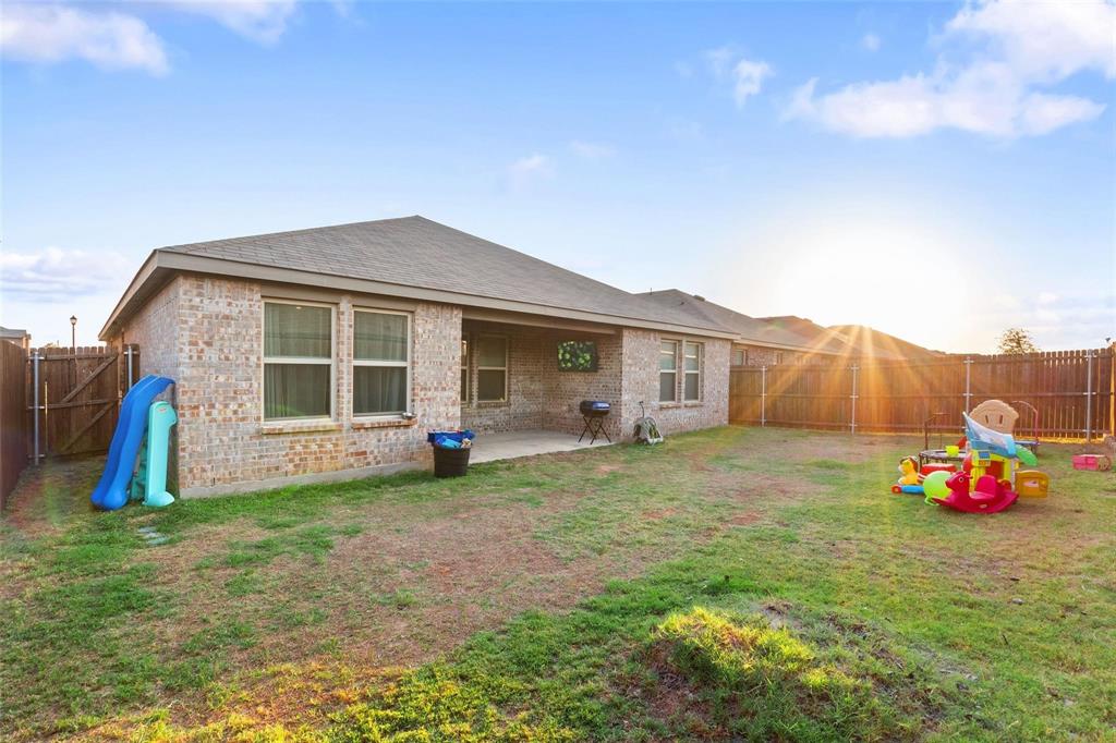 151 Seabiscuit Road Caddo Mills, TX 75135 - Photo 34 of 40 a front view of a house with garden