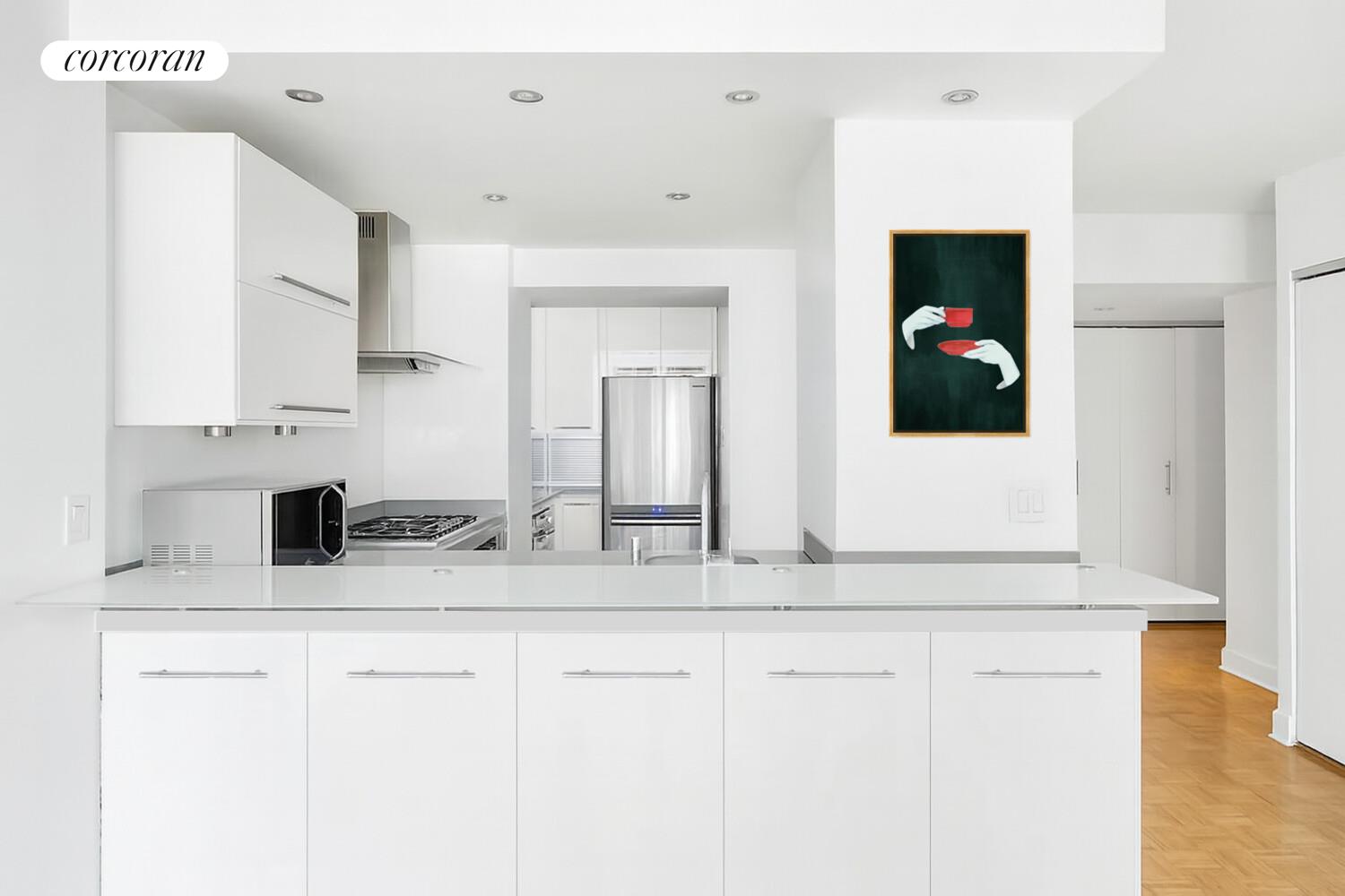 250 East 40th Street, Unit 17F Manhattan, NY 10016 - Photo 3 of 16 a bathroom with a sink and a mirror