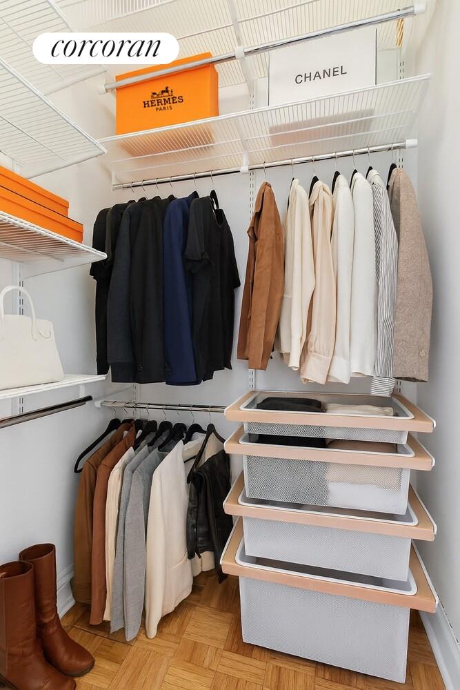 250 East 40th Street, Unit 17F Manhattan, NY 10016 - Photo 6 of 16 a view of walk in closet with clothes and shoes