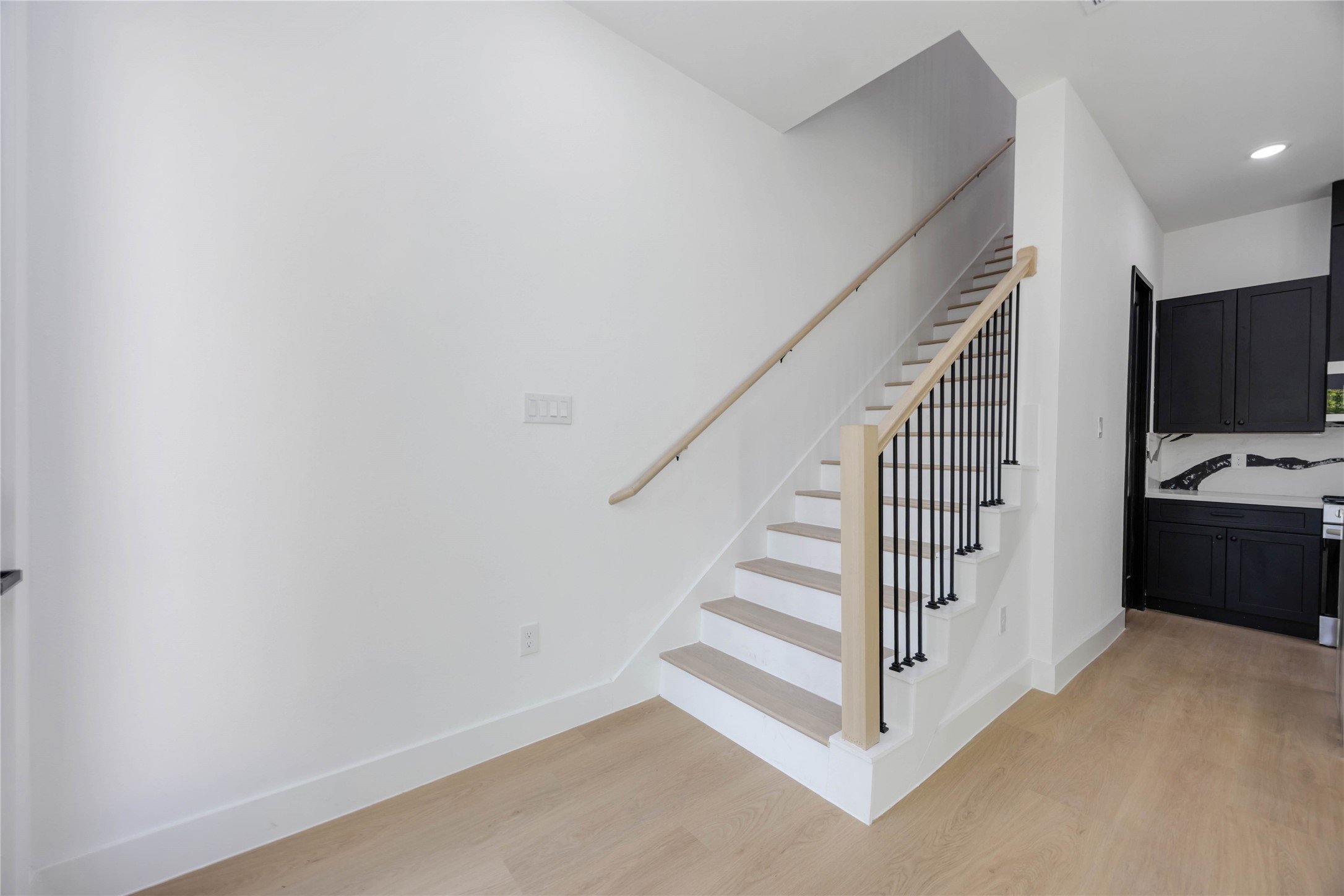3920 Aledo Street, Unit AB Houston, TX 77051 - Photo 13 of 27 a view of entryway with wooden floor