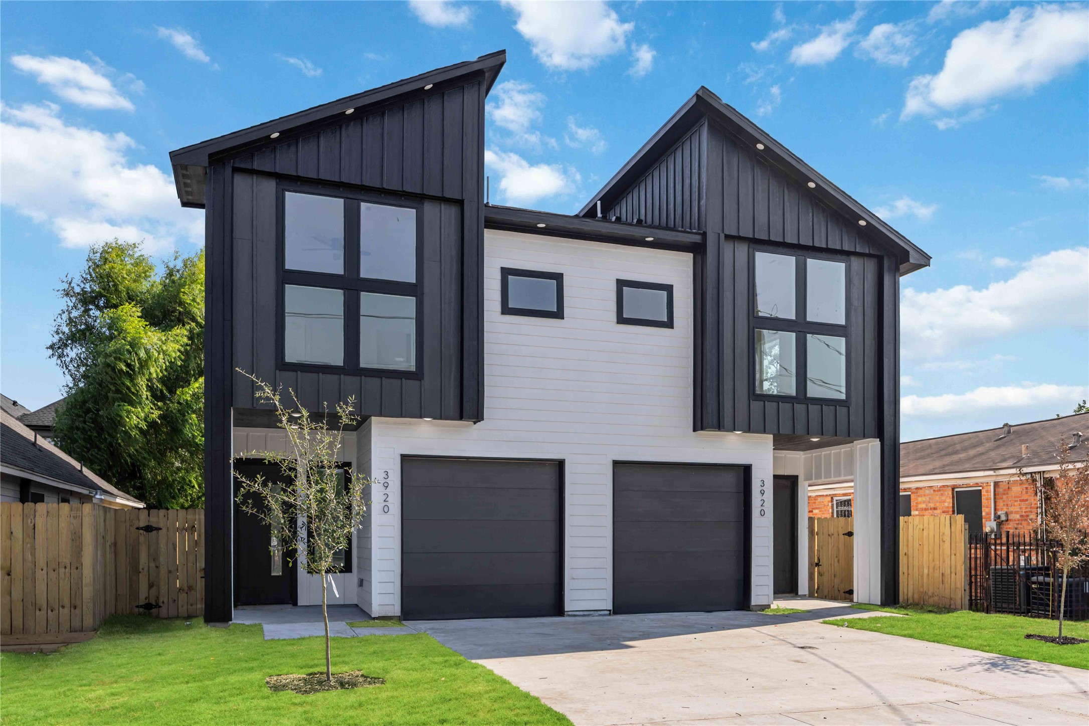 3920 Aledo Street, Unit AB Houston, TX 77051 - Photo 2 of 27 a front view of a house with garden