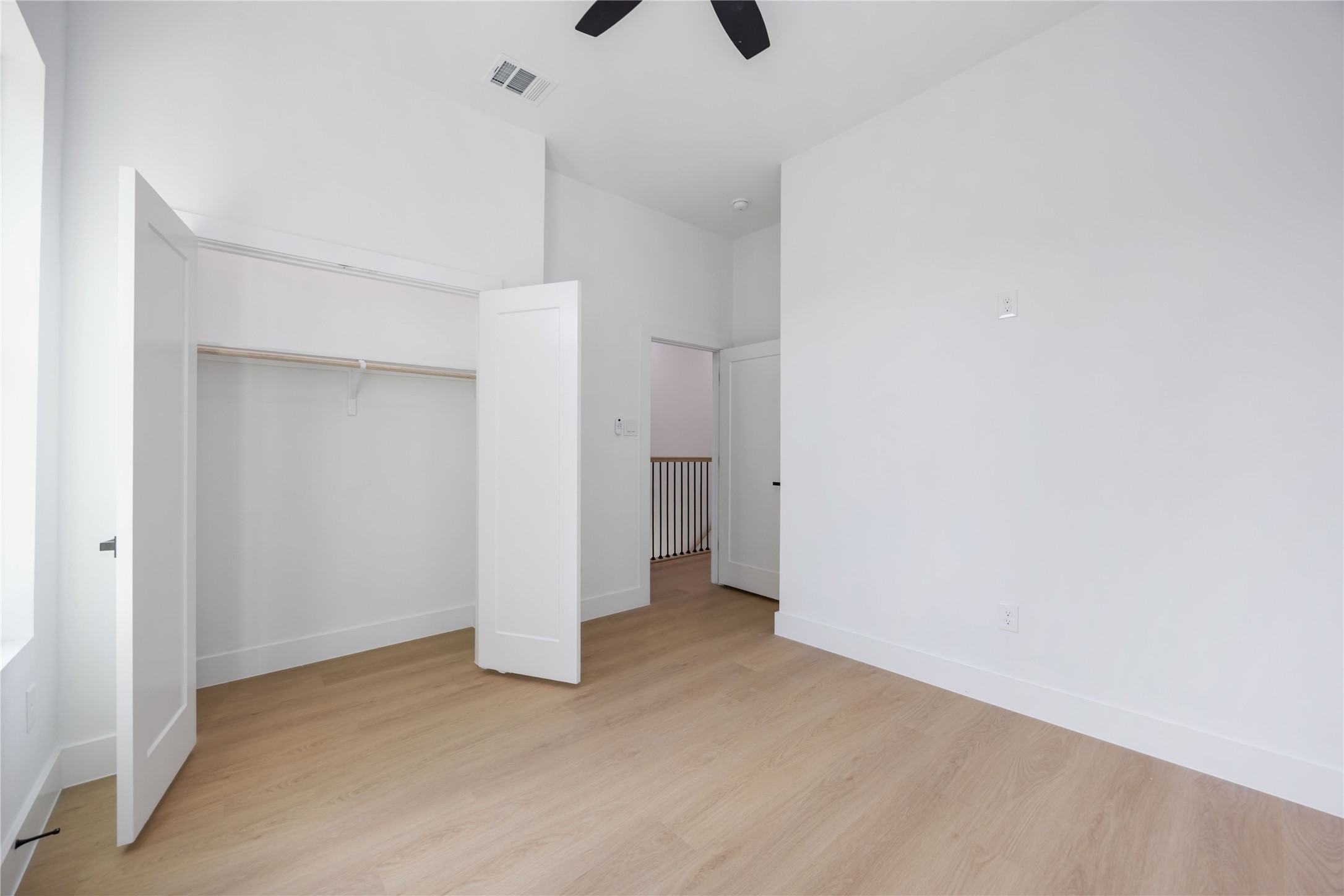 3920 Aledo Street, Unit AB Houston, TX 77051 - Photo 24 of 27 a view of an empty room with a ceiling fan