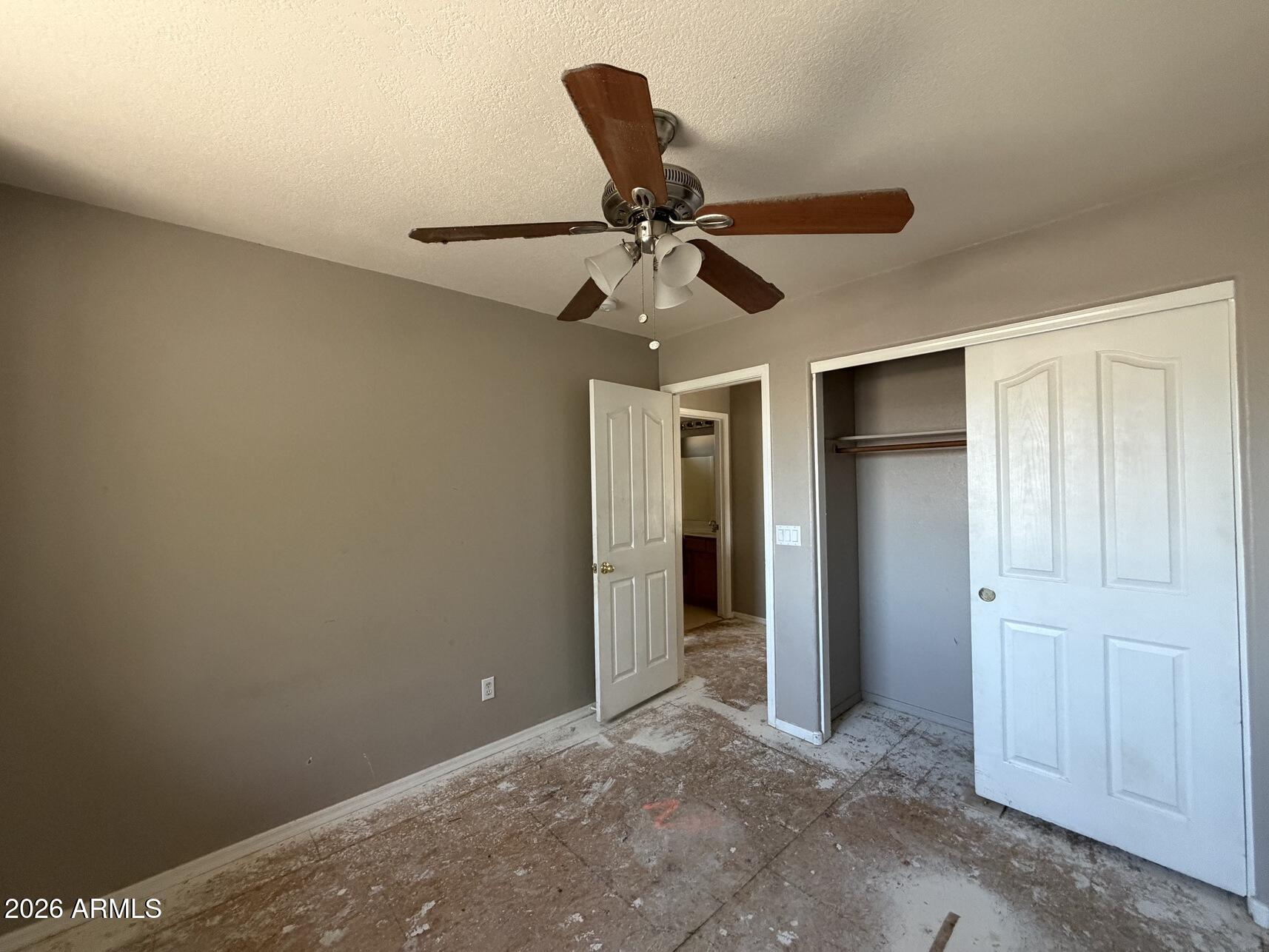 10807 West Monte Vista Road Avondale, AZ 85392 - Photo 23 of 33 a view of a livingroom with a ceiling fan and a ceiling fan