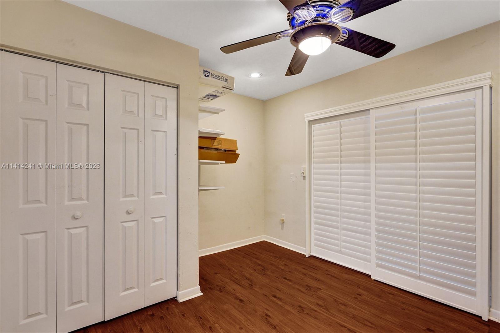 9020 Southwest 187th Terrace Cutler Bay, FL 33157 - Photo 20 of 55 a view of empty room with wooden floor