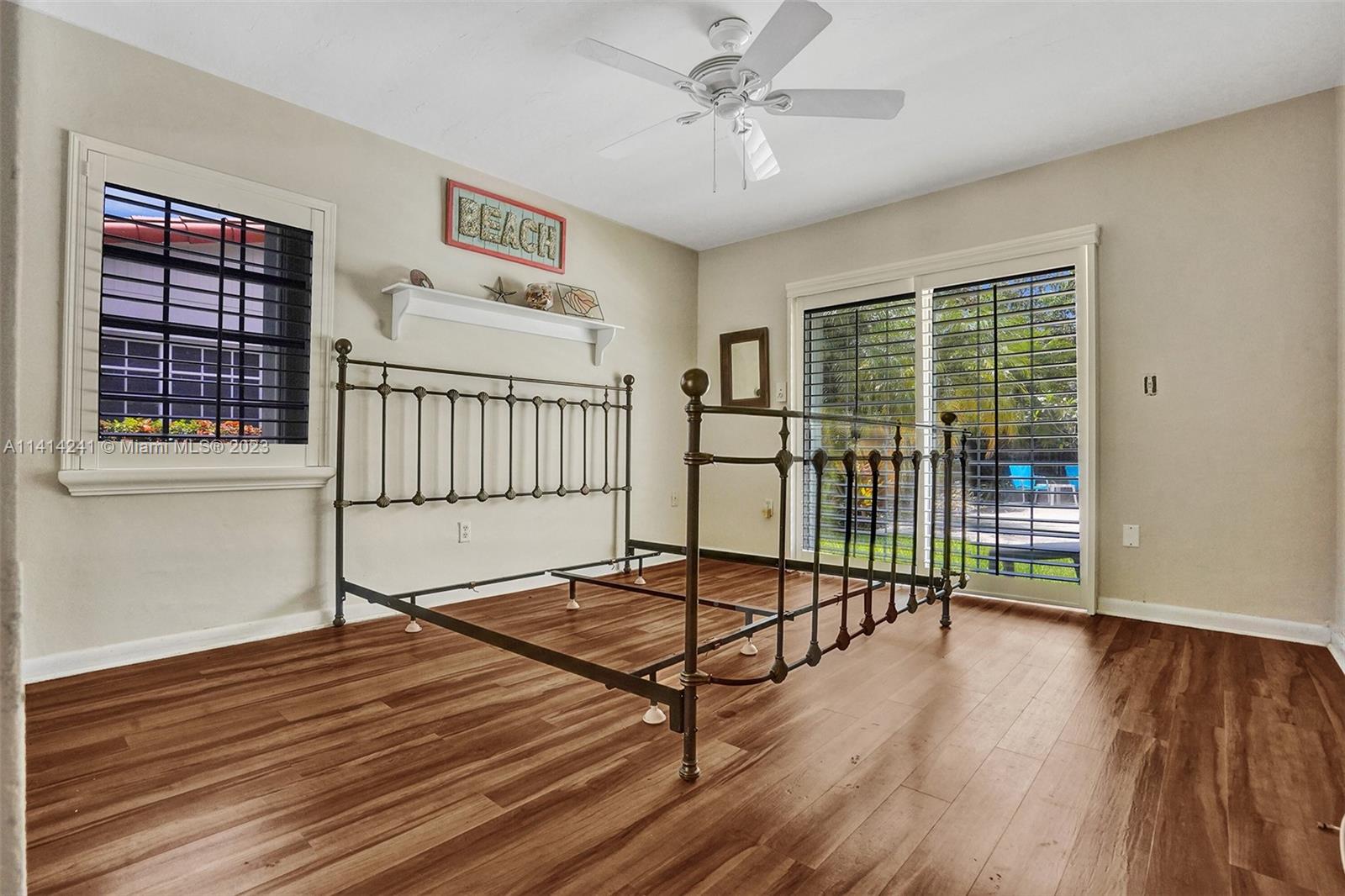 9020 Southwest 187th Terrace Cutler Bay, FL 33157 - Photo 22 of 55 a view of a livingroom with furniture and hardwood floor