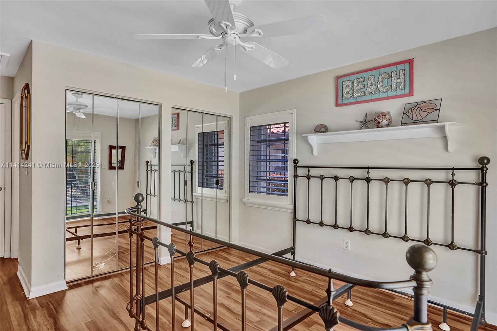 9020 Southwest 187th Terrace Cutler Bay, FL 33157 - Photo 23 of 55 a living room with furniture and a table