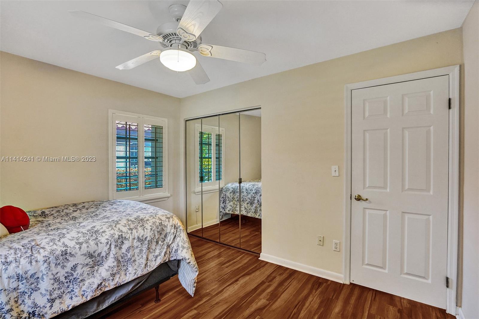 9020 Southwest 187th Terrace Cutler Bay, FL 33157 - Photo 28 of 55 a bedroom with a bed and a window