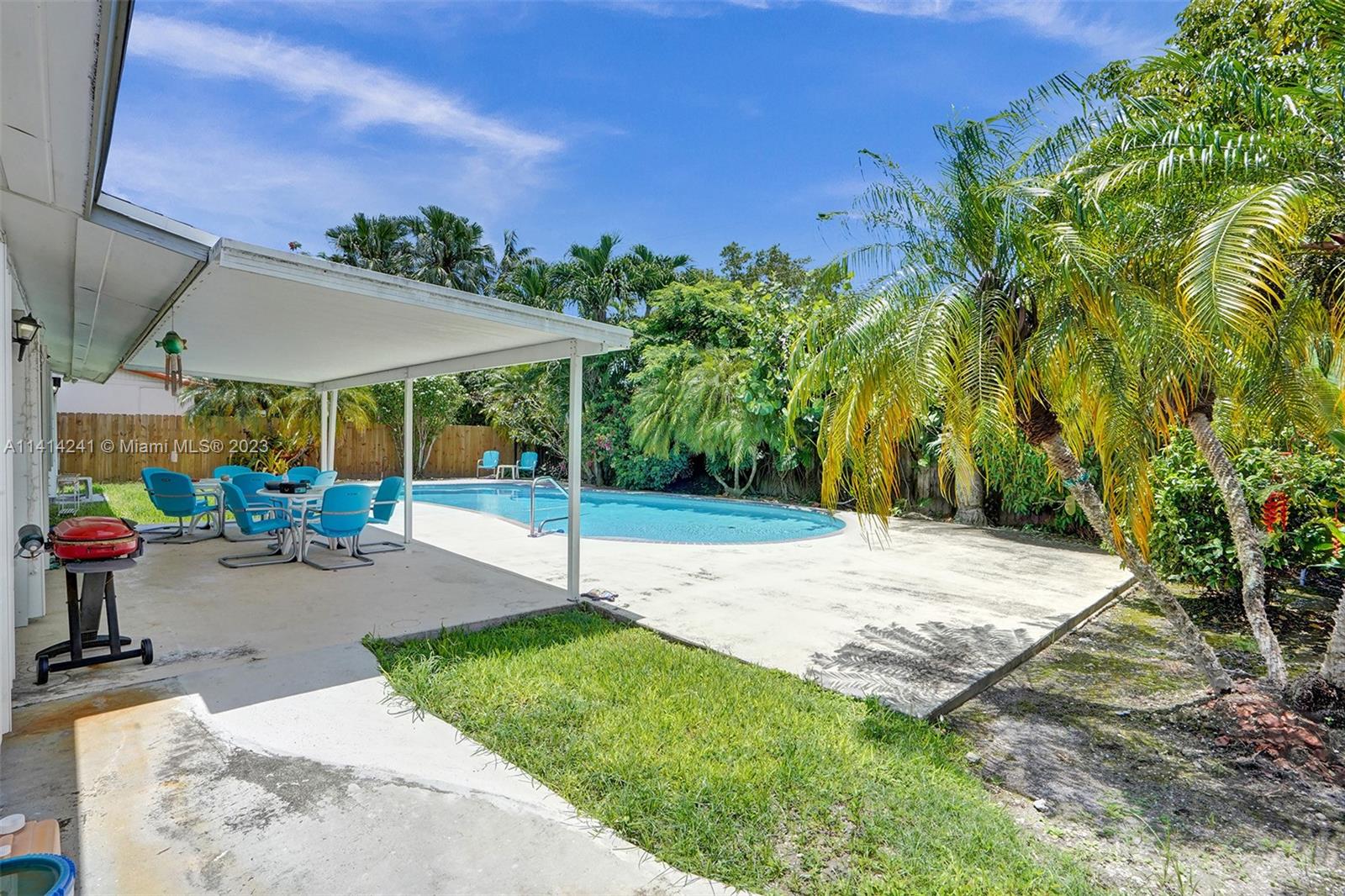 9020 Southwest 187th Terrace Cutler Bay, FL 33157 - Photo 38 of 55 a view of a backyard with a patio