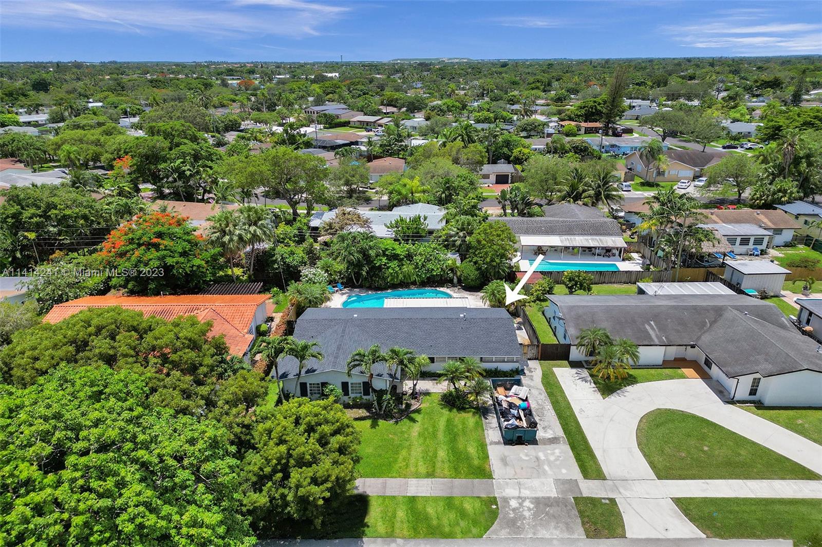 9020 Southwest 187th Terrace Cutler Bay, FL 33157 - Photo 43 of 55 an aerial view of a house with a yard