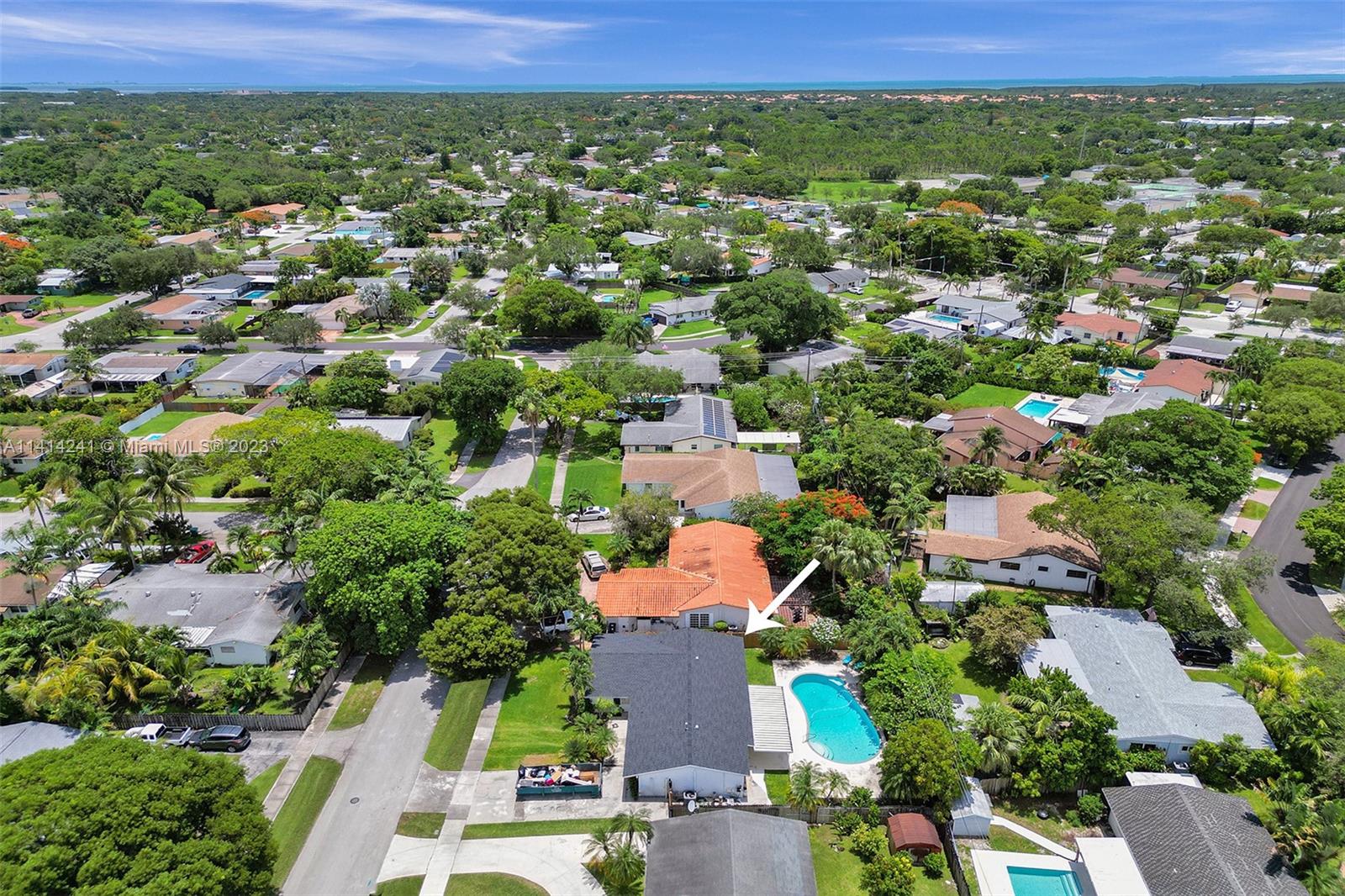 9020 Southwest 187th Terrace Cutler Bay, FL 33157 - Photo 46 of 55 an aerial view of residential houses with outdoor space