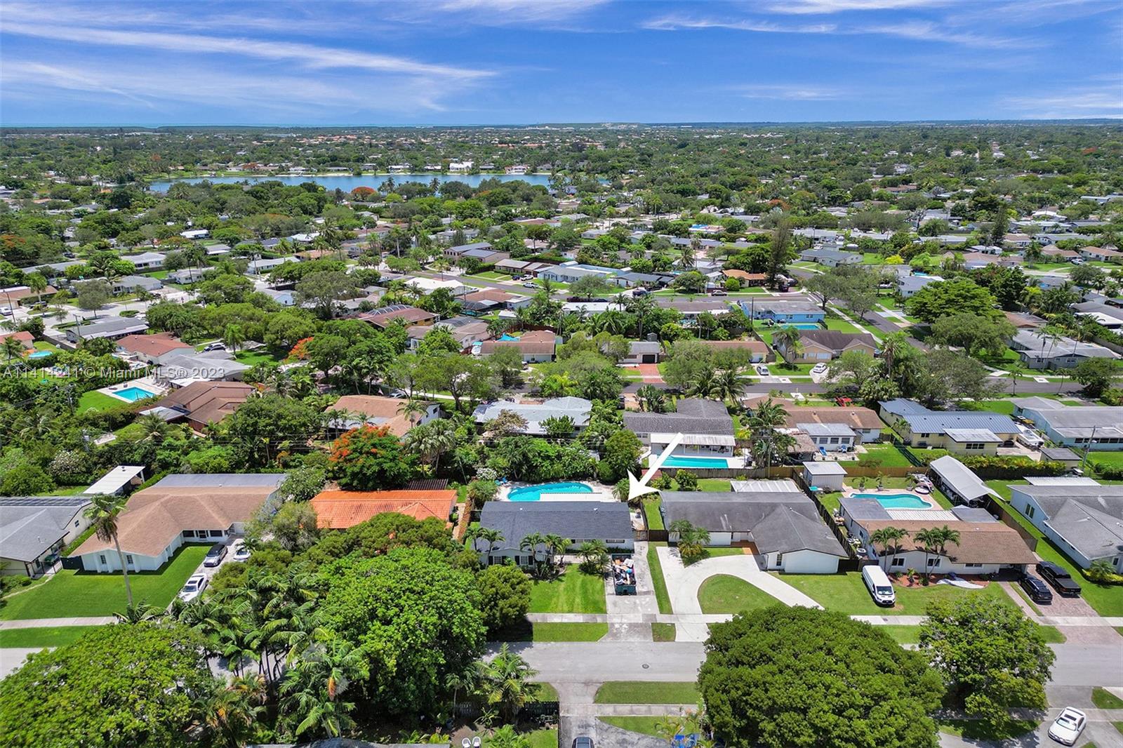 9020 Southwest 187th Terrace Cutler Bay, FL 33157 - Photo 48 of 55 an aerial view of residential houses with outdoor space and trees