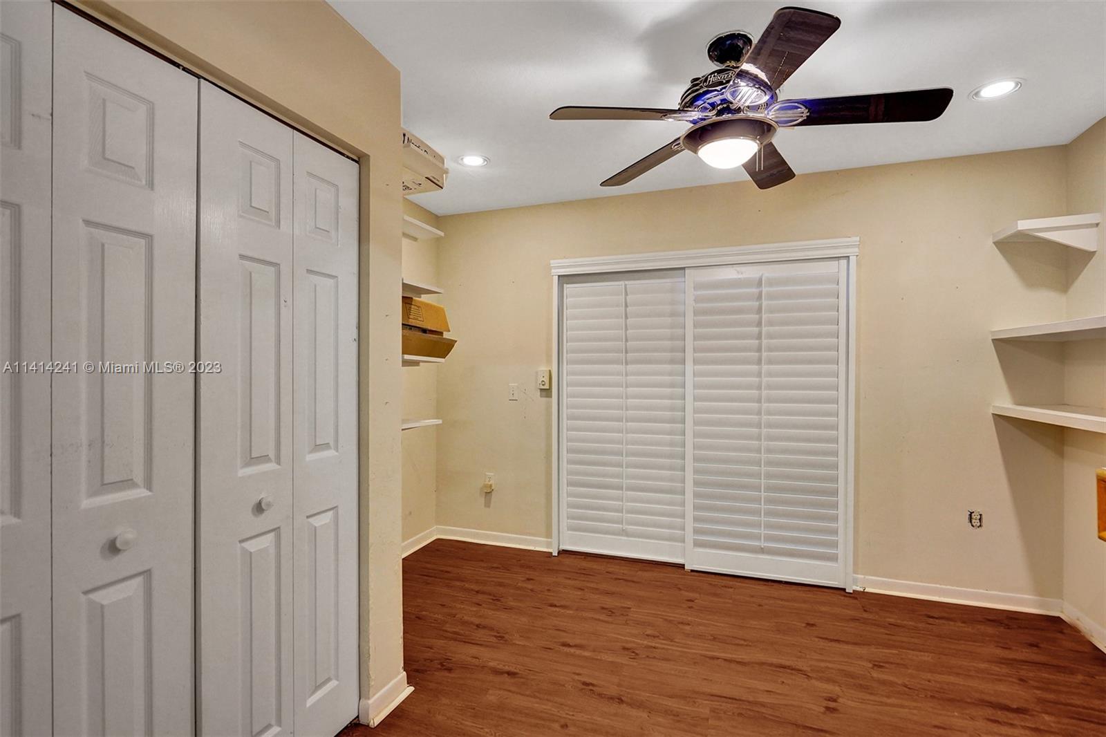 9020 Southwest 187th Terrace Cutler Bay, FL 33157 - Photo 7 of 55 a view of empty room with wooden floor