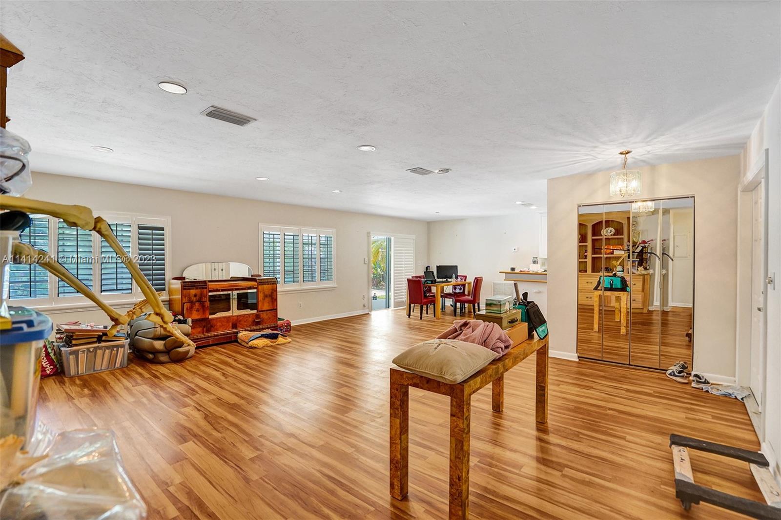 9020 Southwest 187th Terrace Cutler Bay, FL 33157 - Photo 10 of 55 a living room with furniture and a wooden floor
