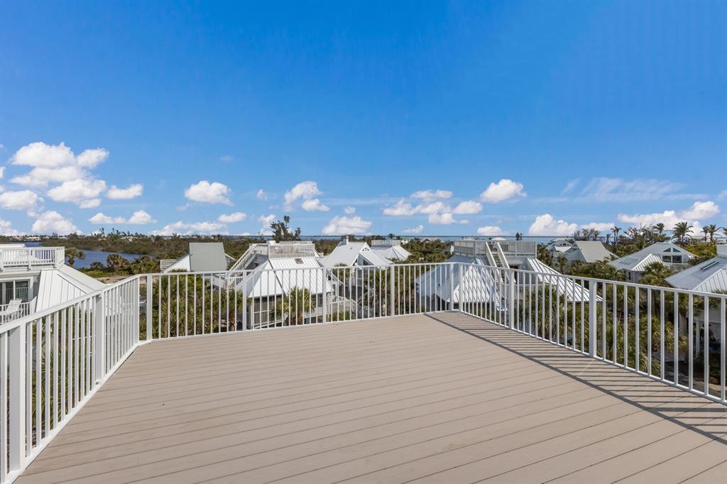 5000 Gasparilla Road, Unit VH37 Boca Grande, FL 33921 - Photo 32 of 54 a balcony with view of city
