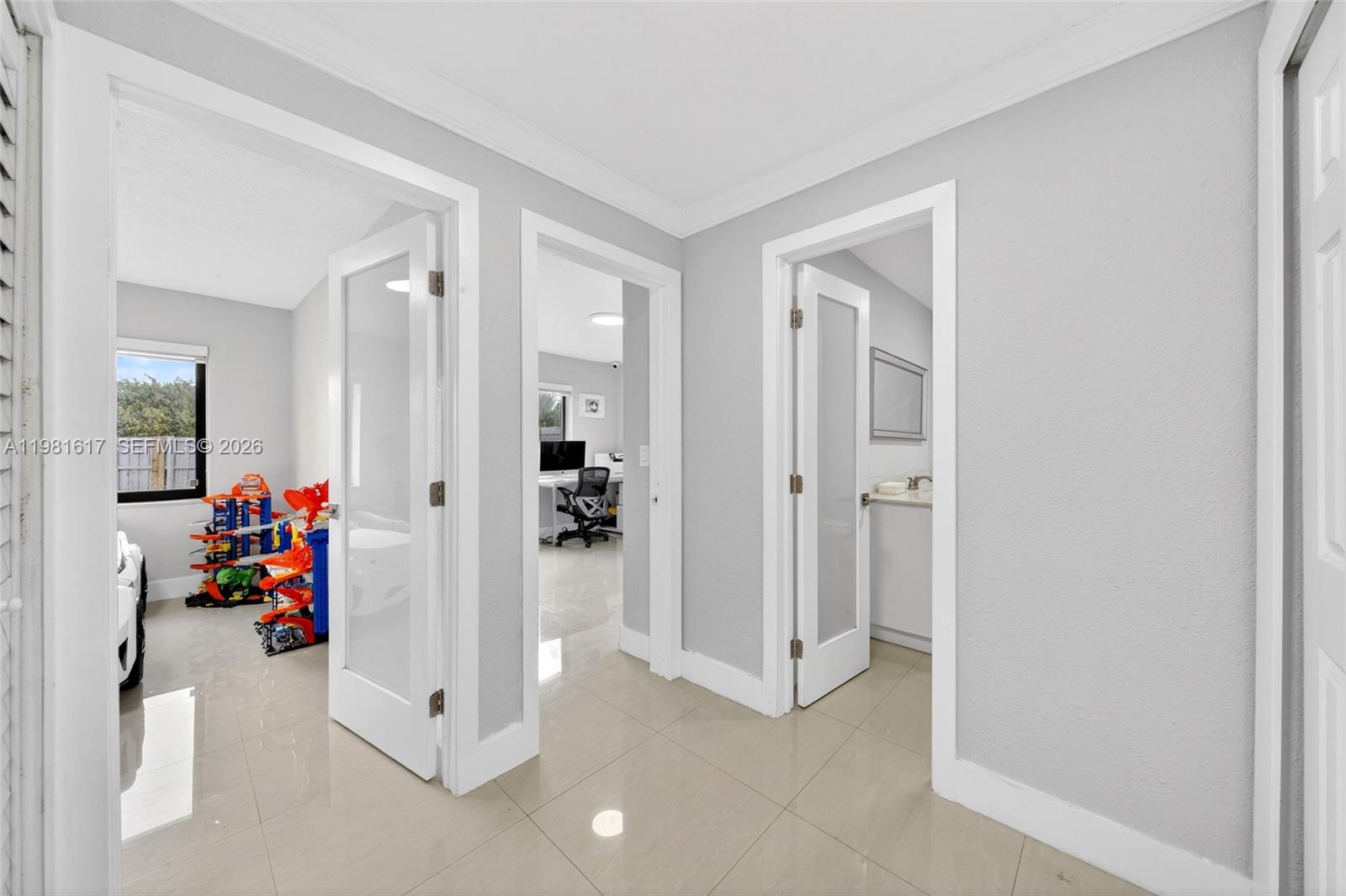 11951 Southwest 120th Terrace Miami, FL 33186 - Photo 31 of 55 wooden floor to ceiling window and a room