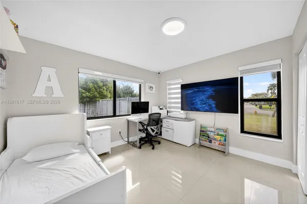 a view of a storage & utility room with sink
