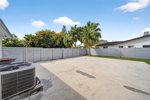 a view of a swimming pool with a slide