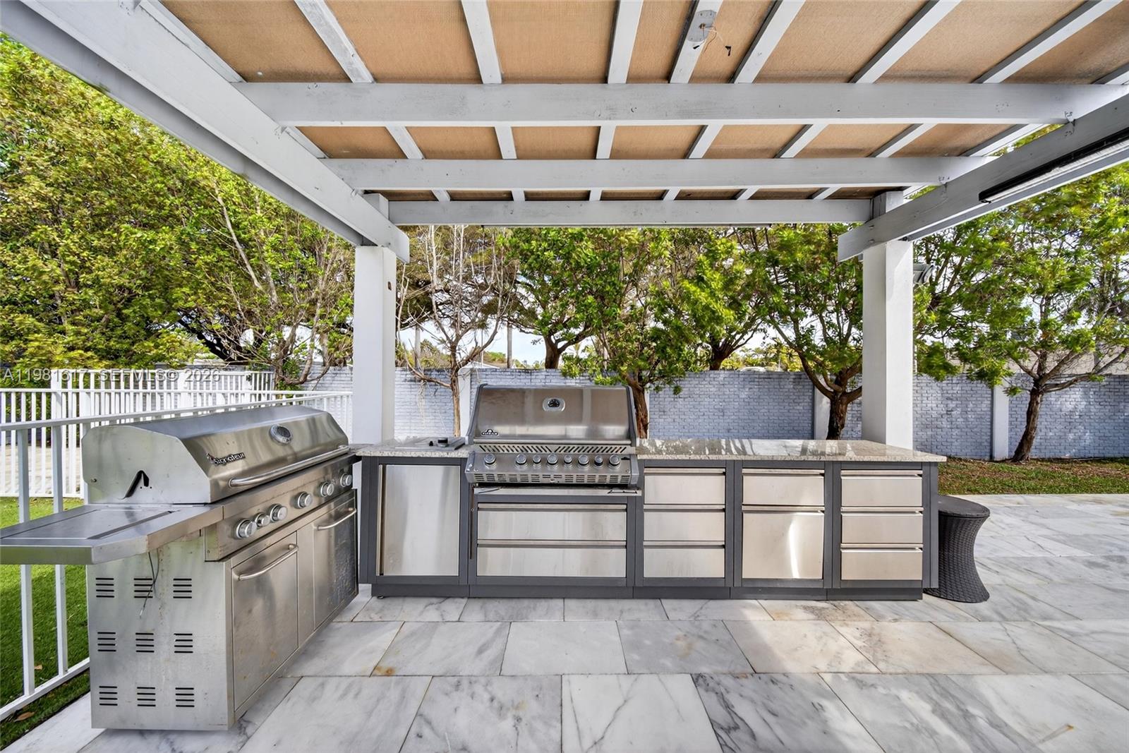 11951 Southwest 120th Terrace Miami, FL 33186 - Photo 45 of 55 a view of a kitchen with outdoor kitchen