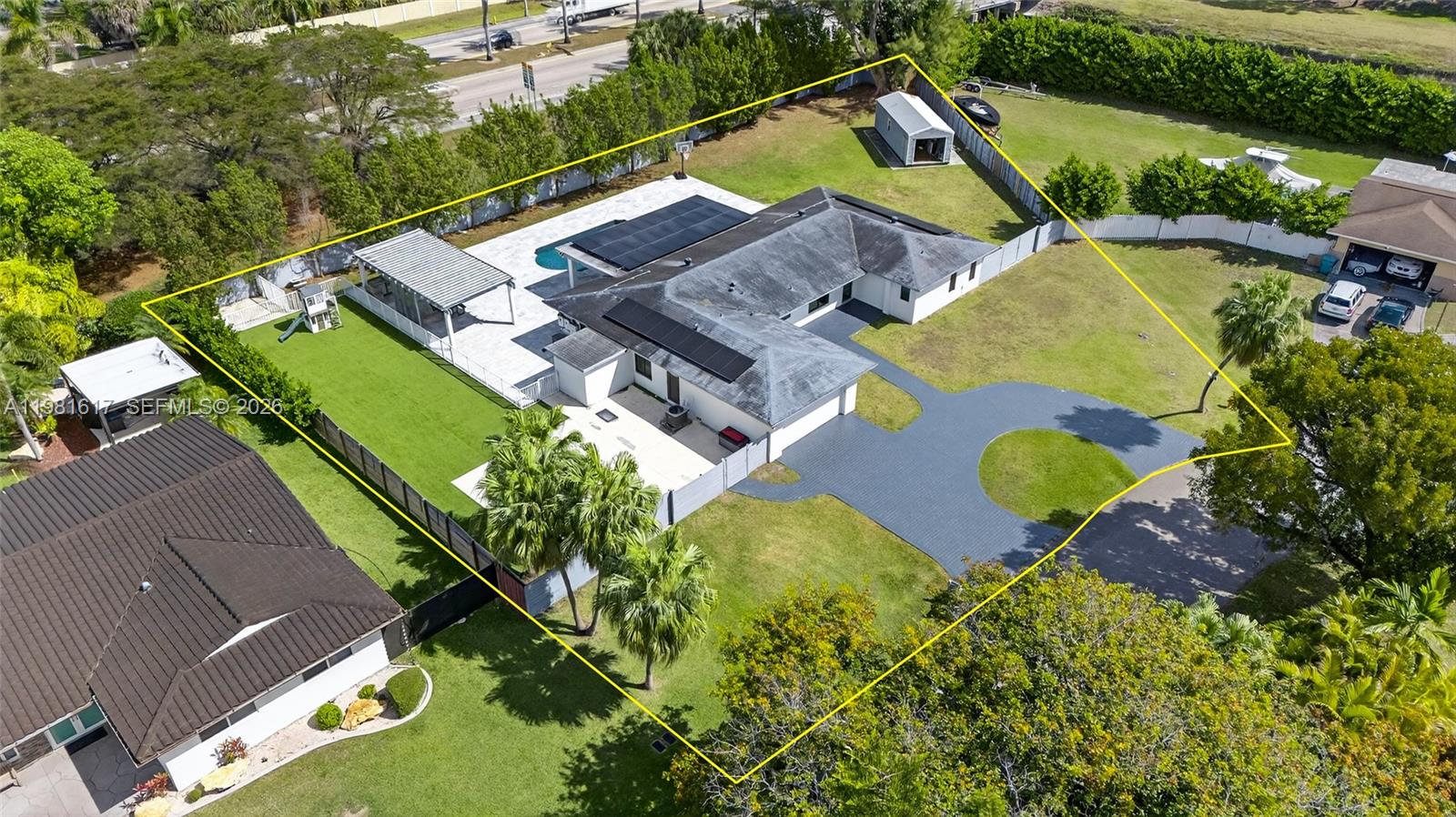 11951 Southwest 120th Terrace Miami, FL 33186 - Photo 5 of 55 an aerial view of a house with a swimming pool