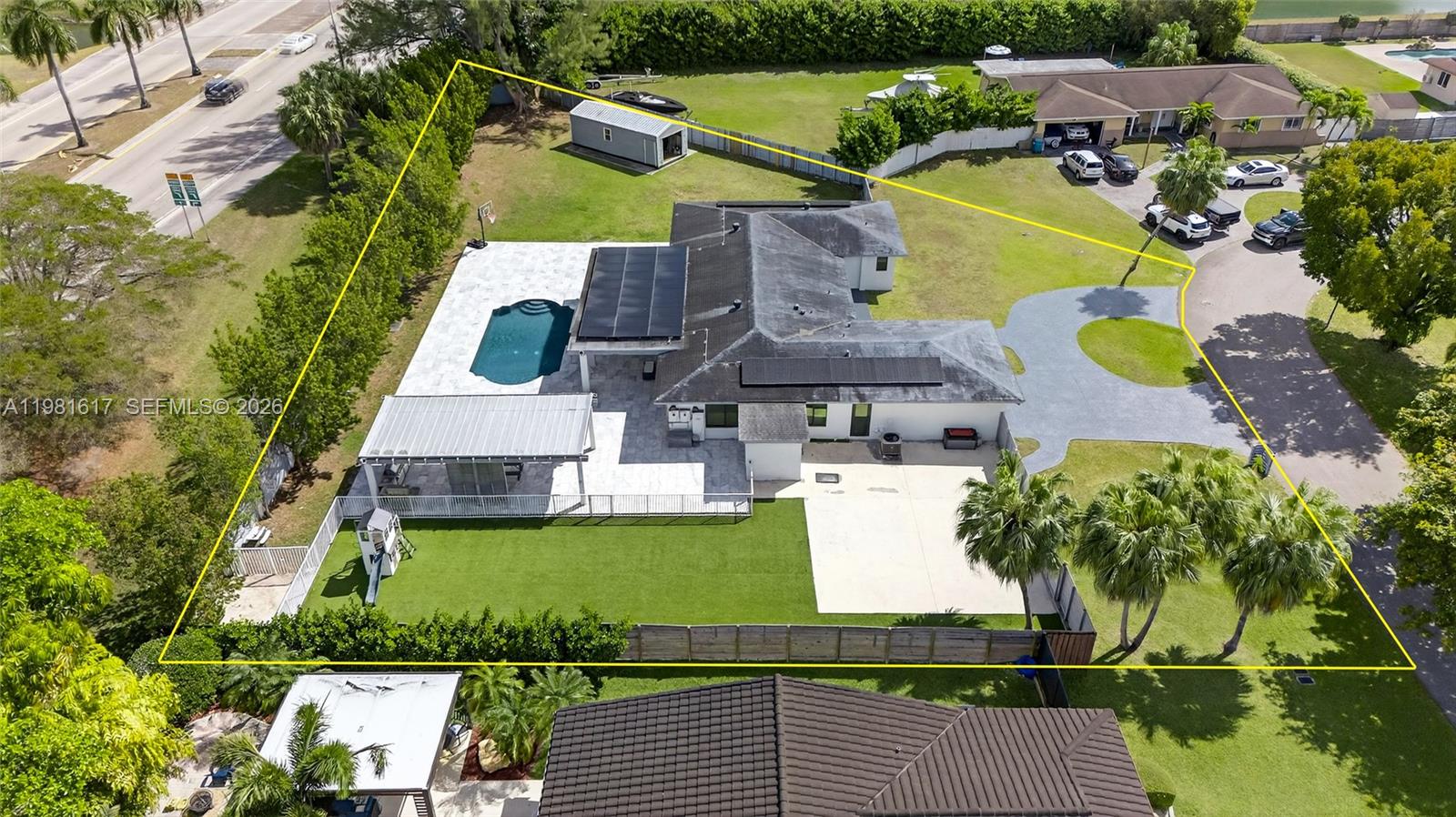 11951 Southwest 120th Terrace Miami, FL 33186 - Photo 6 of 55 an aerial view of residential houses with outdoor space and swimming pool